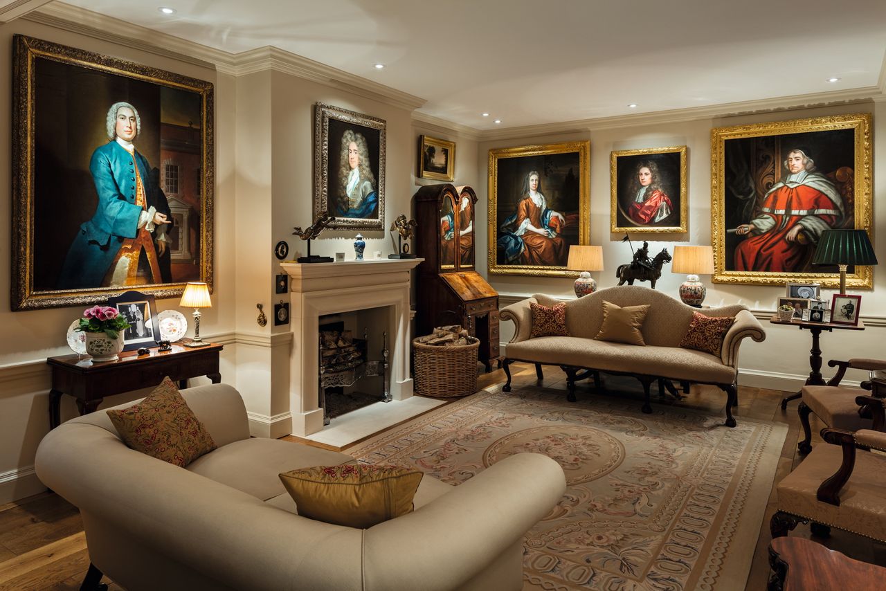 Lighting key features, such as a fireplace or an artwork, is important in any scheme, as demonstrated by TM Lighting.