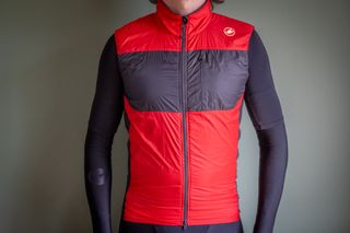 Castelli Unlimited Puffy Vest in red and black pictured against a plain grey background