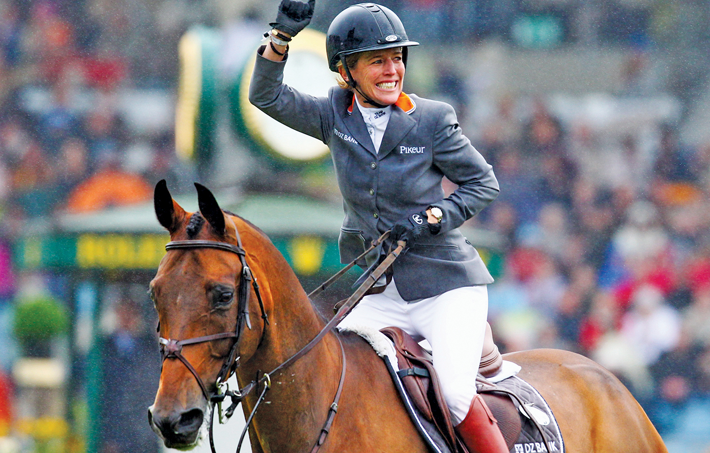 AACHEN, GERMANY - JULY 13: Meredith Michaels-Beerbaum of Germany on her horse Shutterfly celebrates after winning the Warsteiner jumping competition at the CHIO on July 13, 2011 in Aachen, Germany. (Photo by Alex Grimm/Bongarts/Getty Images)