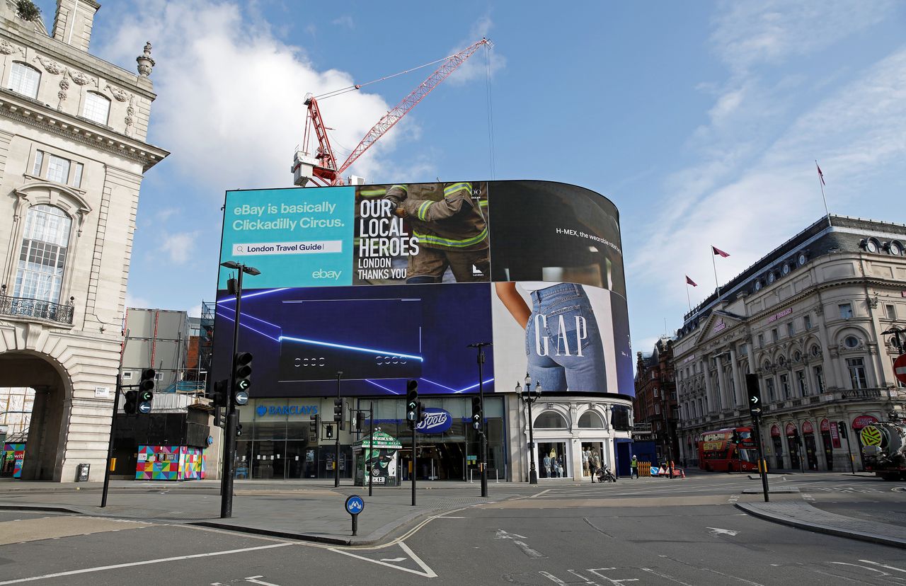 The electronic billboard displays an advert thanking Britain&amp;#039;s emergency services for their dedication during the COVID-19 pandemic, in an empty in Piccadilly Circu in London on April 2, 2020