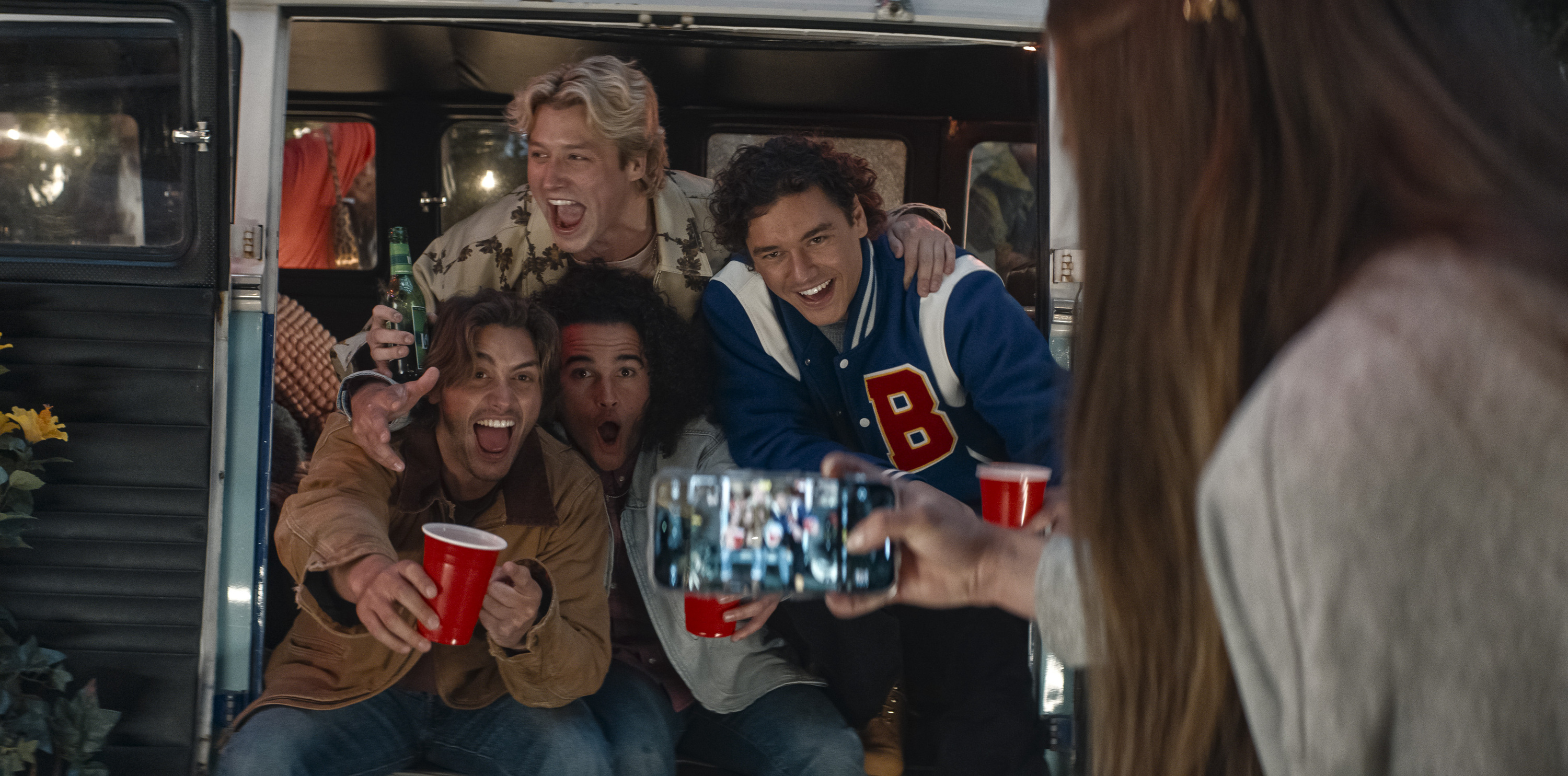 Logan (Antonio Cipriano), Dean (Stephen Thomas Kalyn), Tucker (Jalen Thomas Brooks) and Garrett (Belmont Cameli) cheers red solo cups as they pose together for a tightknit photo in off campus season 1