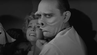 Donna Douglas restrained in fright by William D. Gordon in The Twilight Zone.