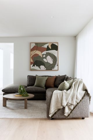 A sofa with neutral tones
