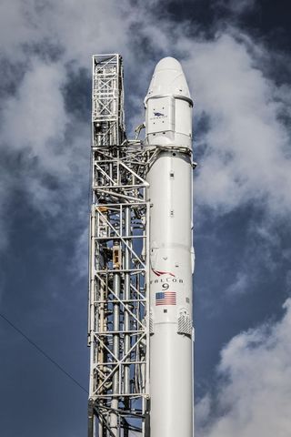 SpaceX's sixth Dragon cargo ship to make a NASA delivery is seen in detail atop its Falcon 9 rocket on April 13, 2015 as it is prepared to launch from a pad at Cape Canaveral Air Force Station in Florida.