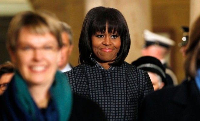 First Lady Michelle Obama walks through the U.S. Capitol Building crypt to watch President Obama be sworn in for a second term.