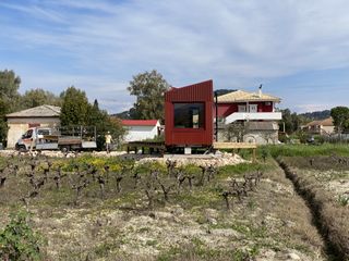 vanato cabin, a red timber cabin on wheels by kasawoo