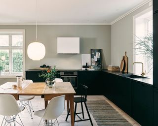 L-shaped black and white kitchen