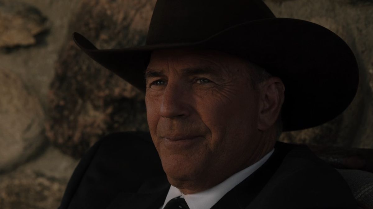 John Dutton in hat on porch on Yellowstone