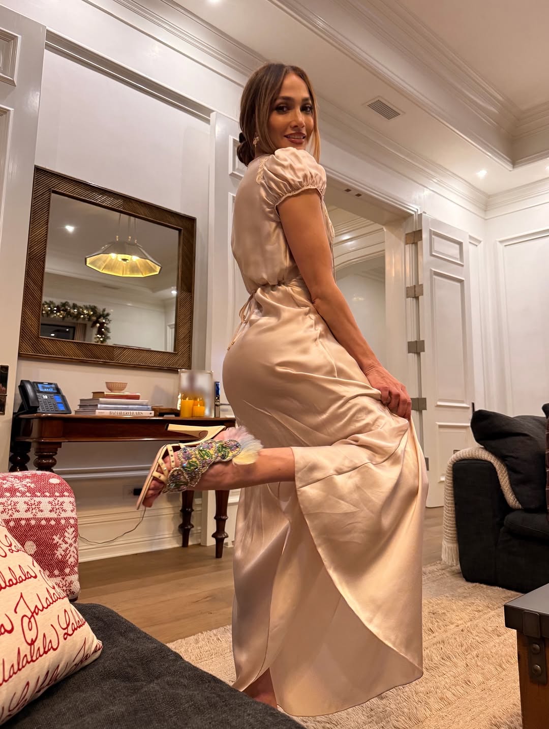 jennifer lopez wears a silk dress for thanksgiving 2025