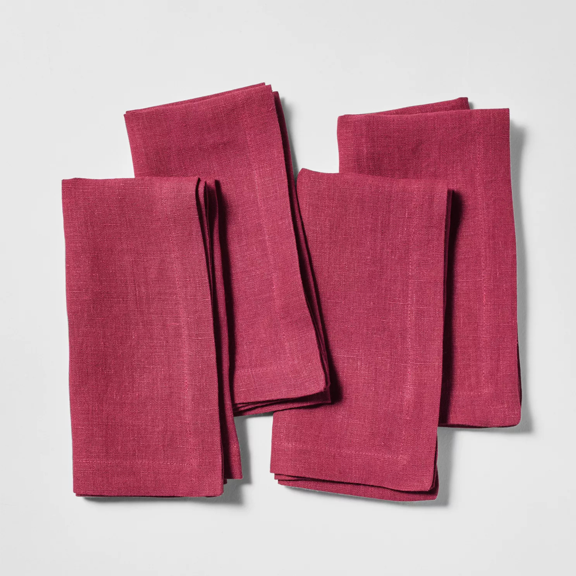 set of four red linen napkins