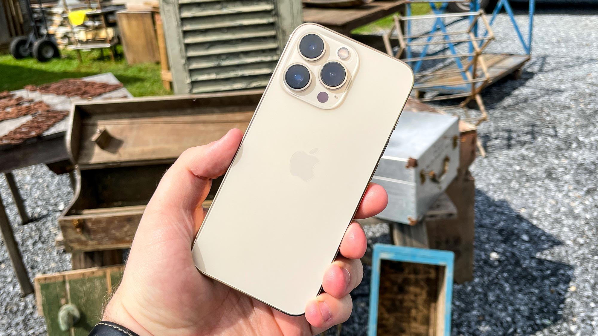 iphone 13 pro left in sunlight with various junk in the background