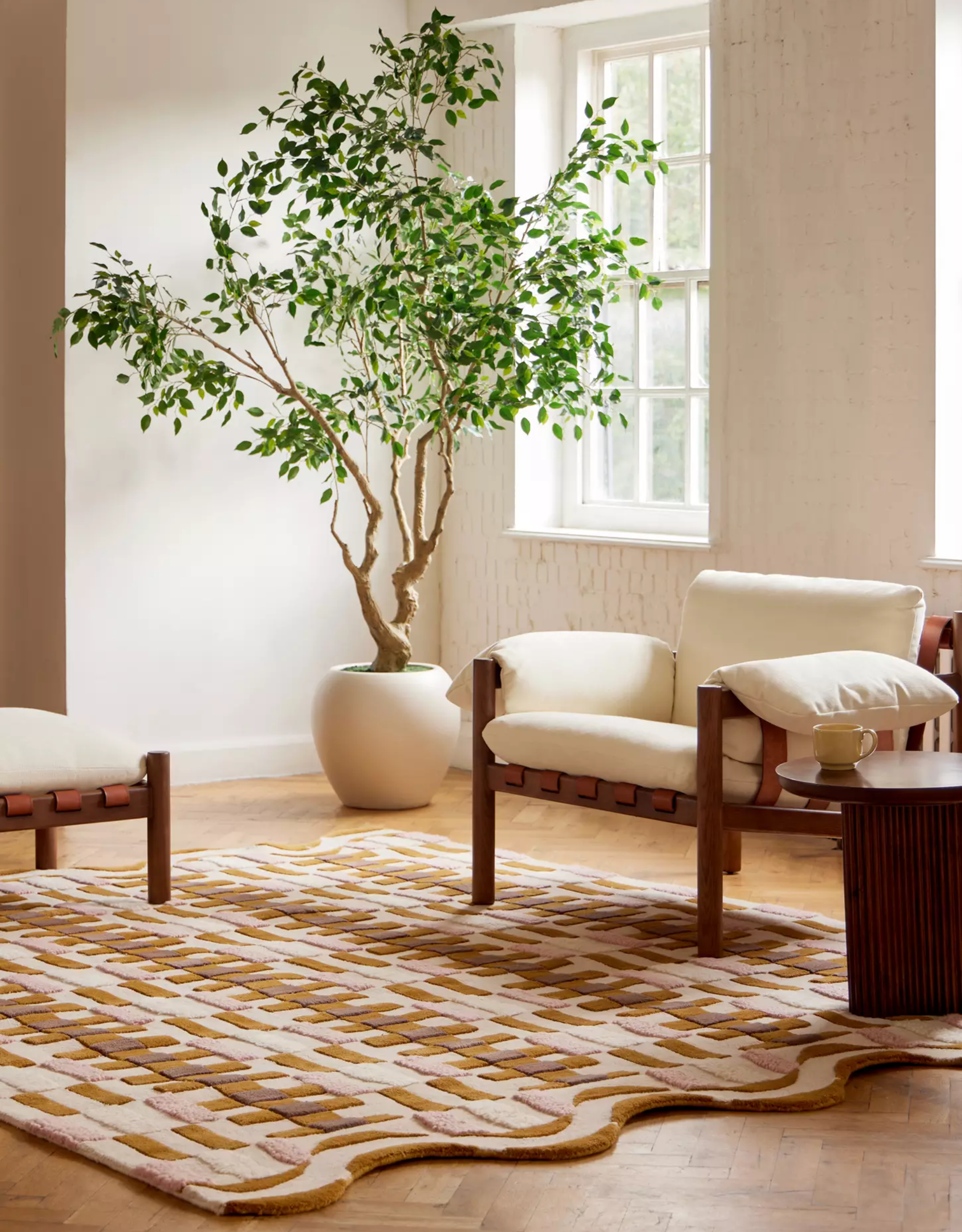 A patterned geometric scalloped rug from Anthropologie