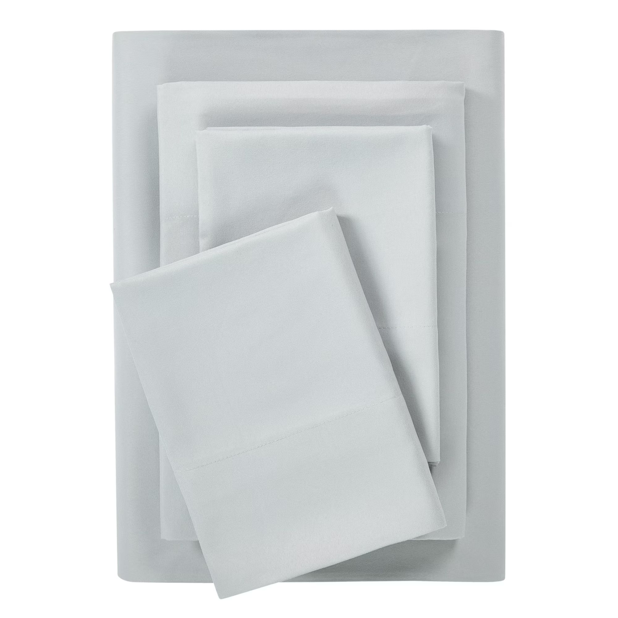 A stack of white bed sheets