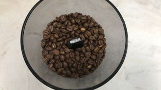 OXO grinder bean hopper full of coffee beans