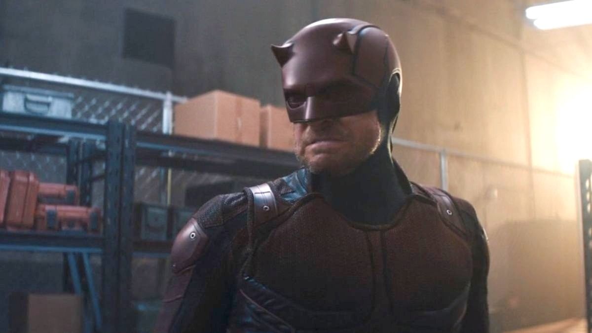 Dardevil grimaces in a warehouse as he looks at an off-camera Maya Lopez in Marvel's Echo TV show