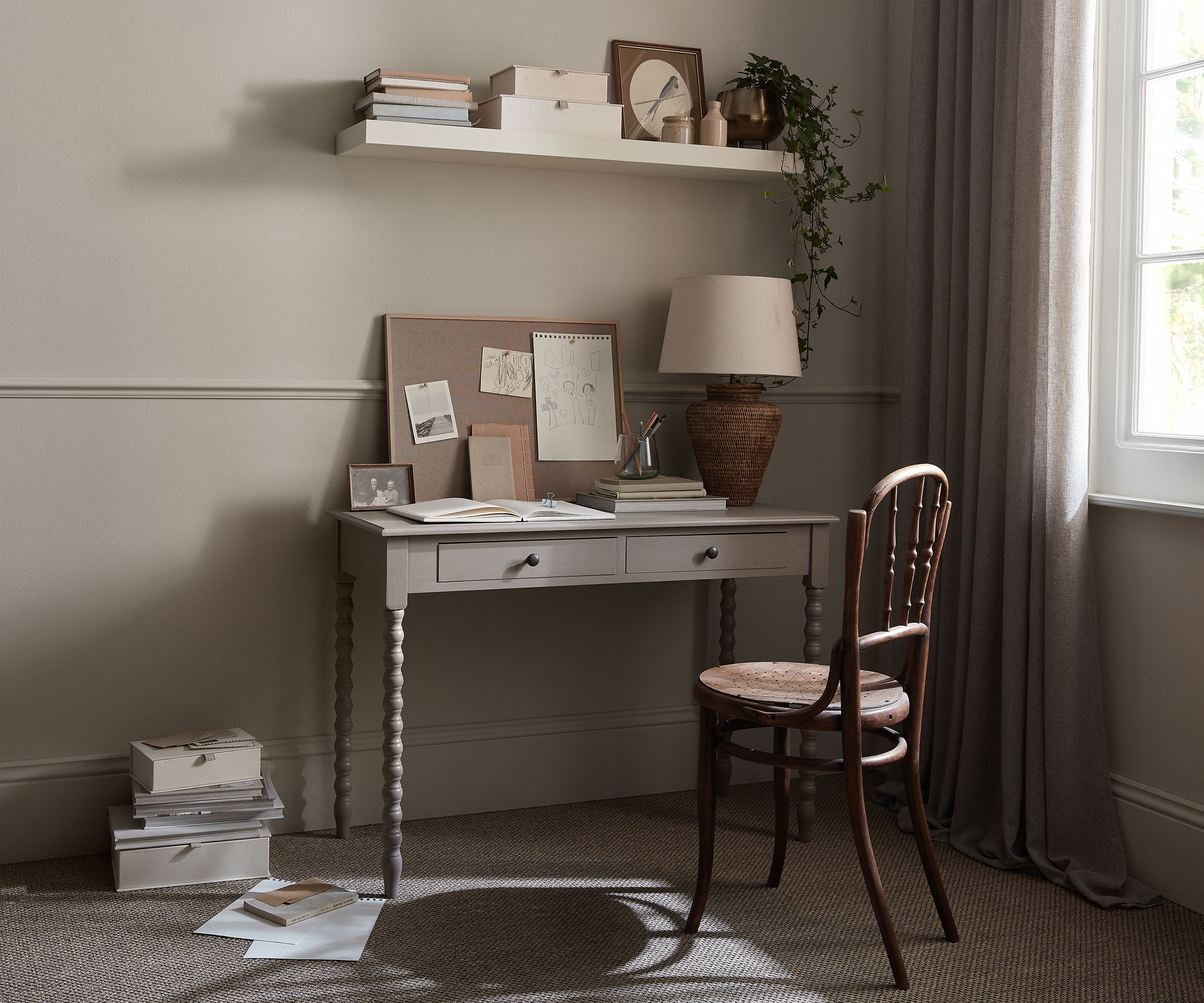 neutral home office with small desk