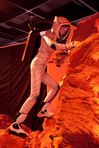 The form-fitting Biosuit spacesuit concept developed by MIT engineers is seen on display at the Beyond Earth exhibition at the American Museum of Natural History in New York City.