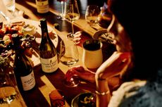 people drinking wine