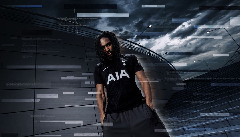 Djed Spence poses in Tottenham&#039;s new away kit for the 2025/26 season