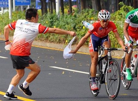 Hong Kong's Kam Po Wong grabs a musette.