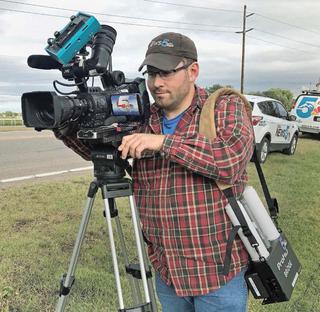 KOAA cameraman Ryan Mutch sets up a shoot using a JVC ProHD Bridge.