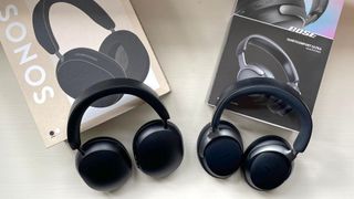 Bose QC Ultra and Sonos Ace headphones with packing cartons