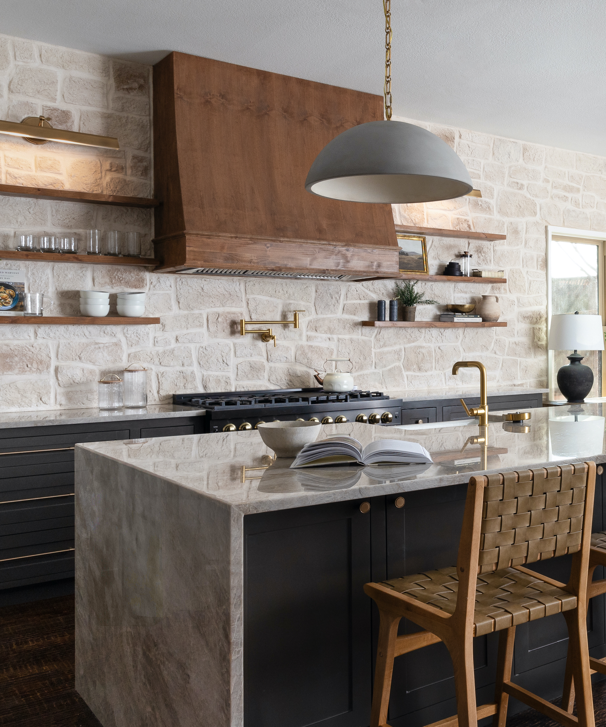kitchen with stone backsplash and island