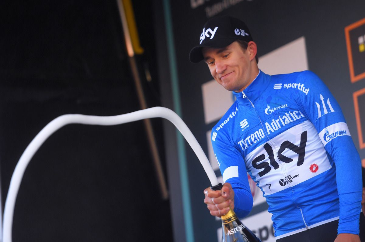 Race leader Michal Kwiatkowski (Team Sky) admiring the spray of the bubbly