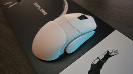 Orbital Pathfinder gaming mouse with various attachments.