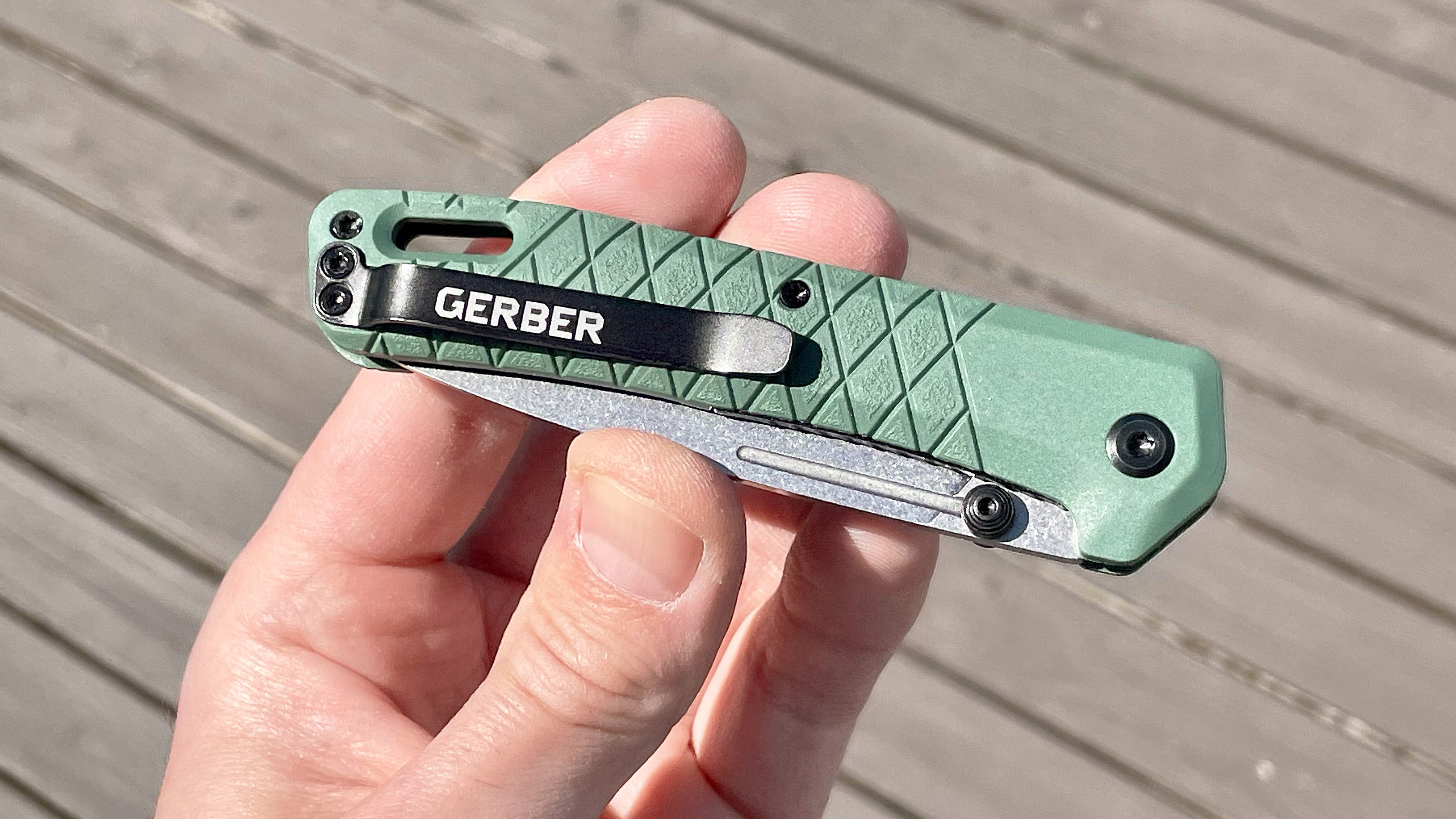 Close-up of the Gerber Zilch pocket knife in a user's hand