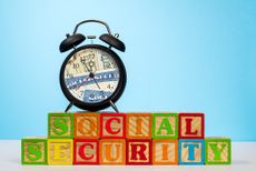 Time running out concept for Social Security trust fund with alarm clock approaching midnight