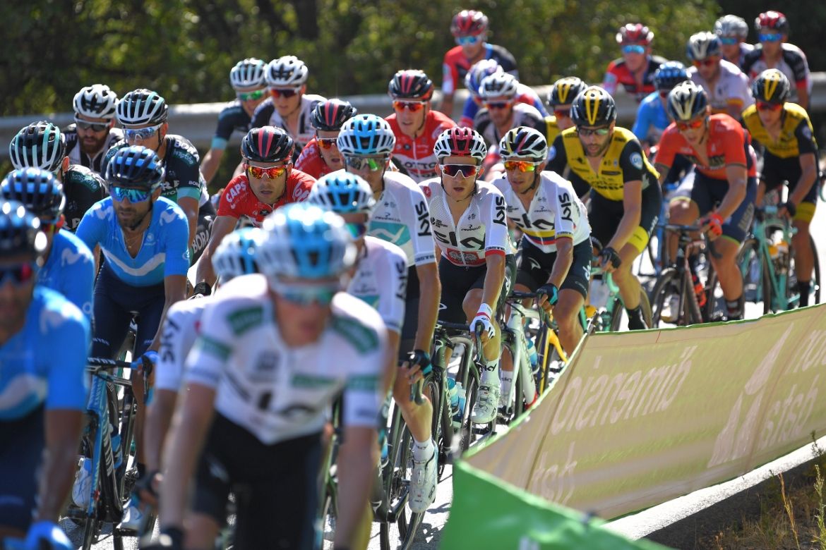 Team Sky set a brisk pace at the front of the peloton for Michal Kwiatkowski