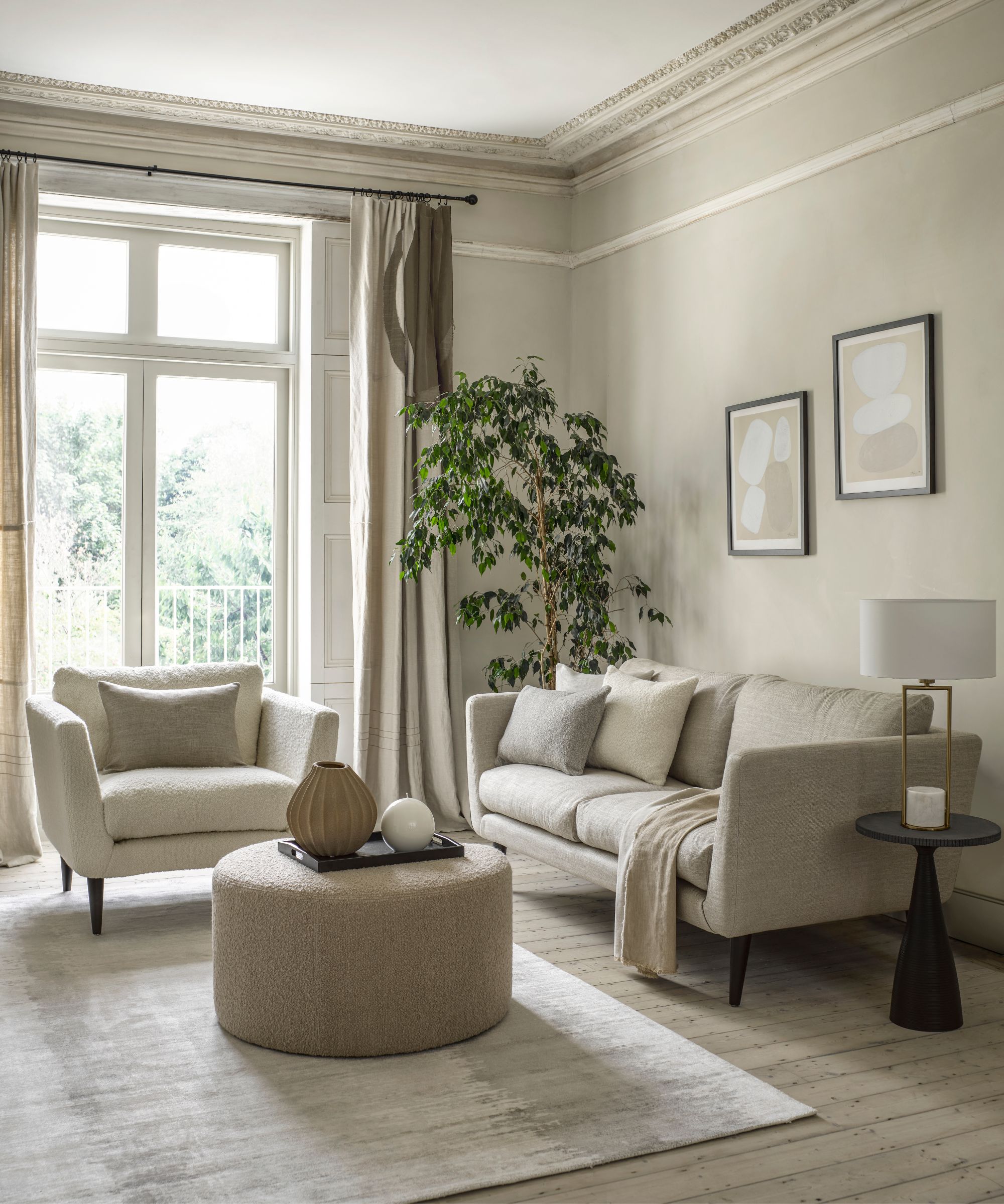 Living room with neutral colored sofa