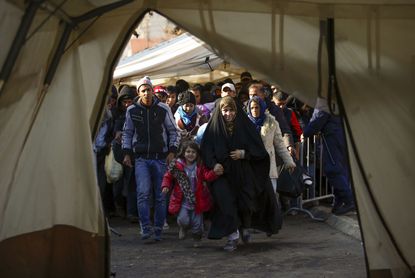 A case is made for why Christians should open their doors to Syrian refugees. 