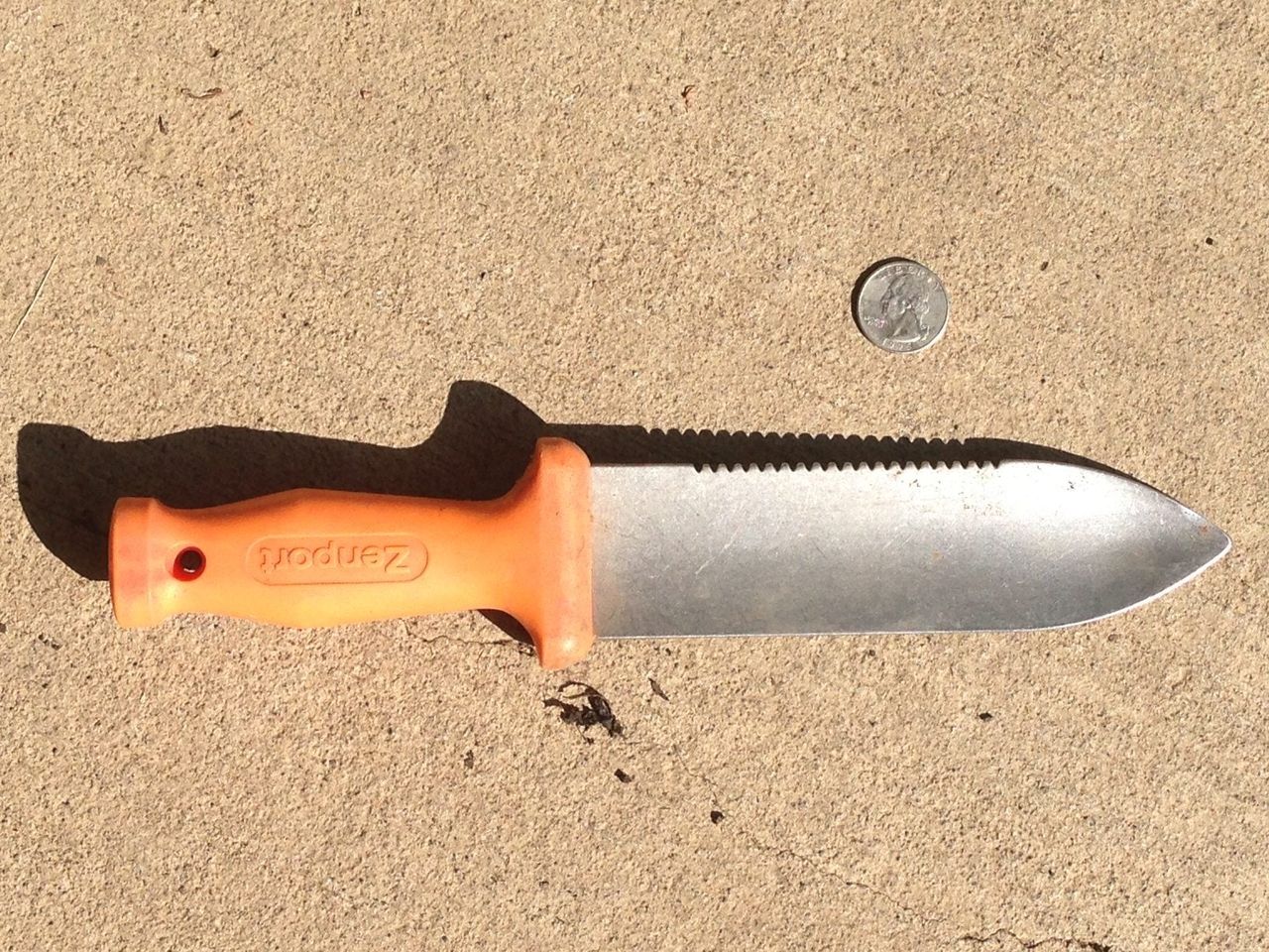 Japanese Digging Knife Next To A Dime