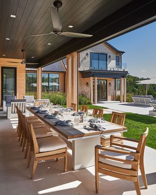 Outdoor dining area with wooden furniture