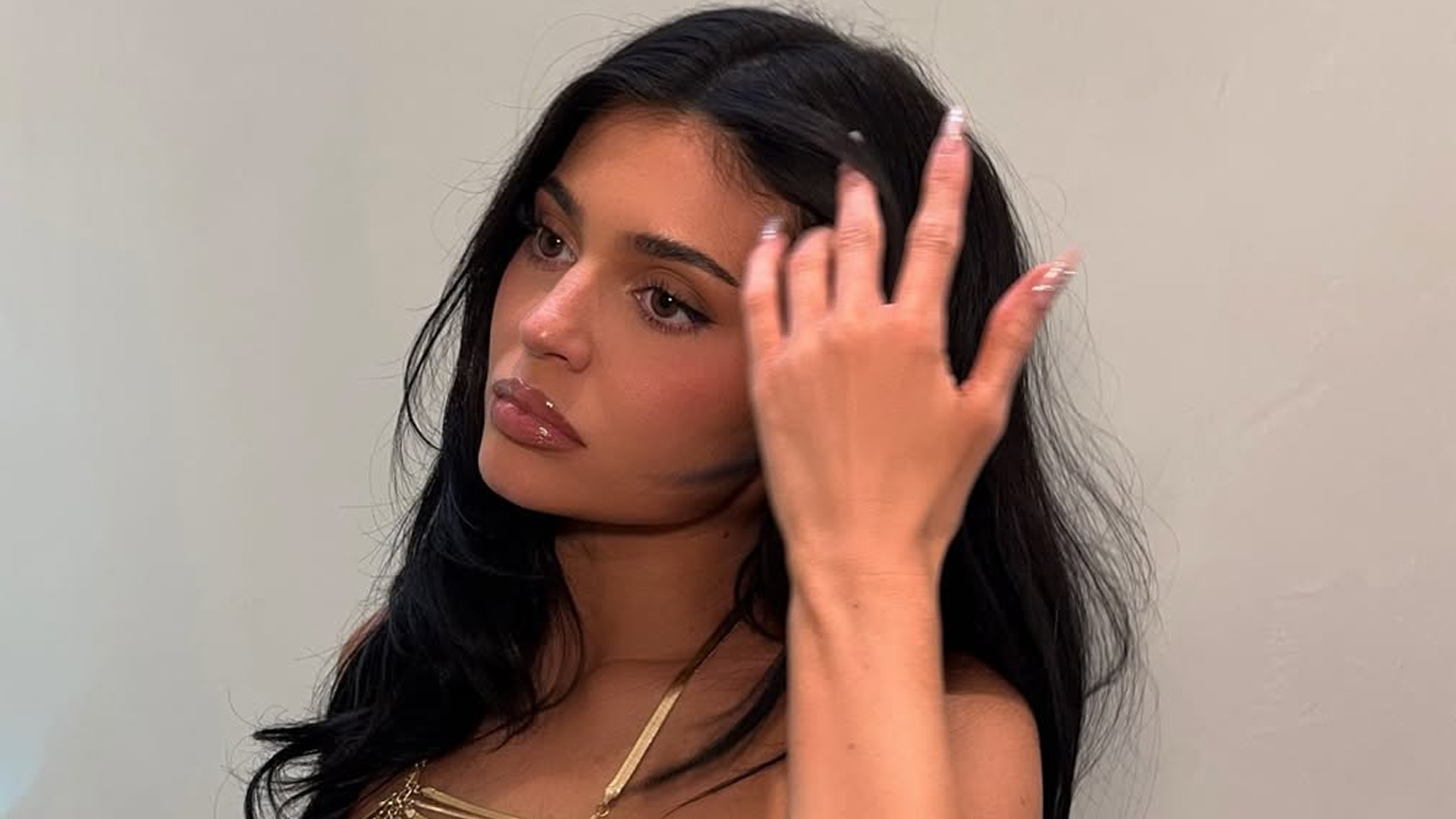 Kylie Jenner went on Kid Cudi's new podcast in a bomber jacket, straight-leg jeans, and pointy pumps