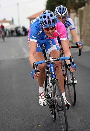 Ballan drives with Pozzato following