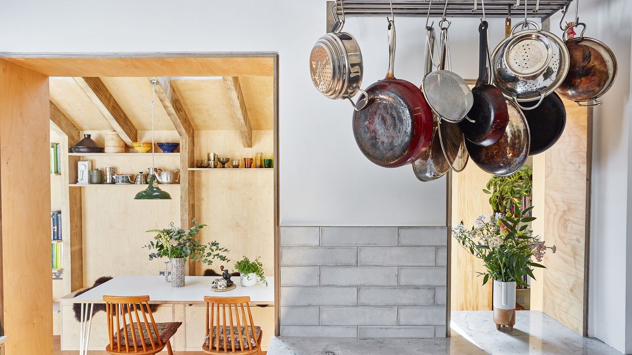 kitchen with hanging pans