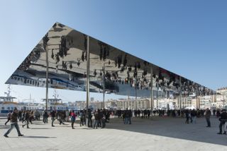 The Marseille Vieux Port Pavilion by Foster + Partners, seen here on a sunny day and full of people