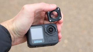 GoPro HERO13 Black action camera held in a hand