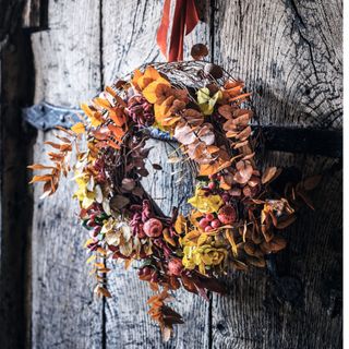 autumn wreath on wooden door