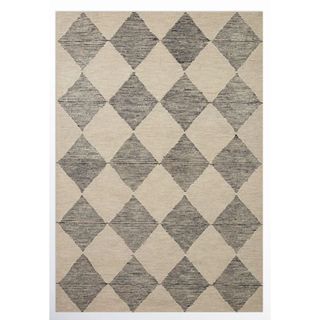 A black and white chequered wool rug