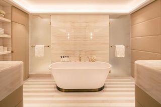 Four Seasons Hyde Park, Bathroom, A white marble clab bathroom at the Four Seasons Hyde Park, complete with plush towels and Bvlgari products