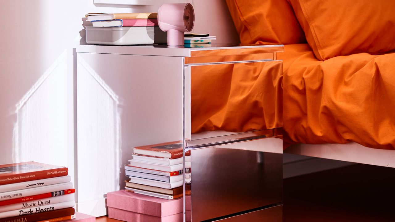 IKEA MALM Chest of 2 drawers, mirror effect in a bedroom