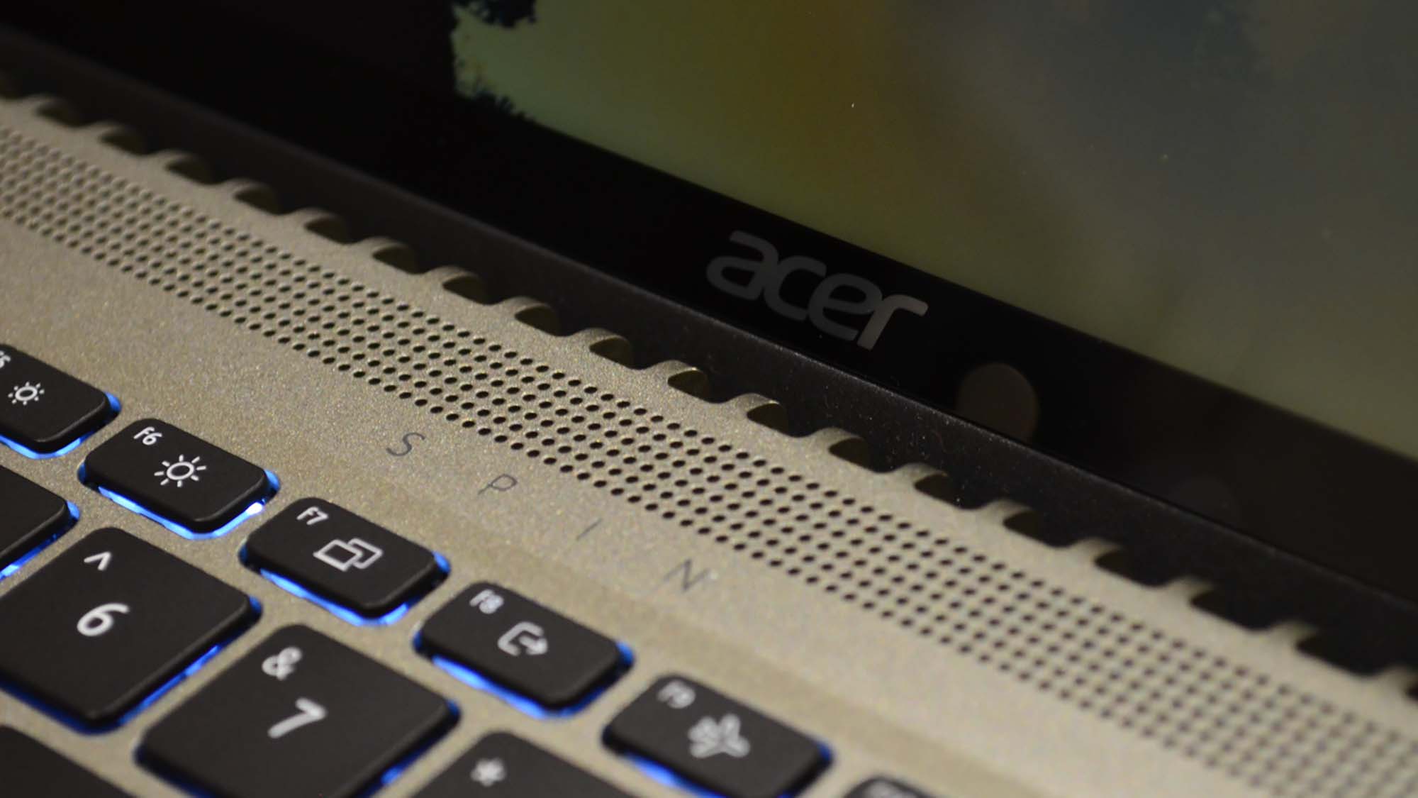 An Acer Spin 5 (2022) on a wood grain table