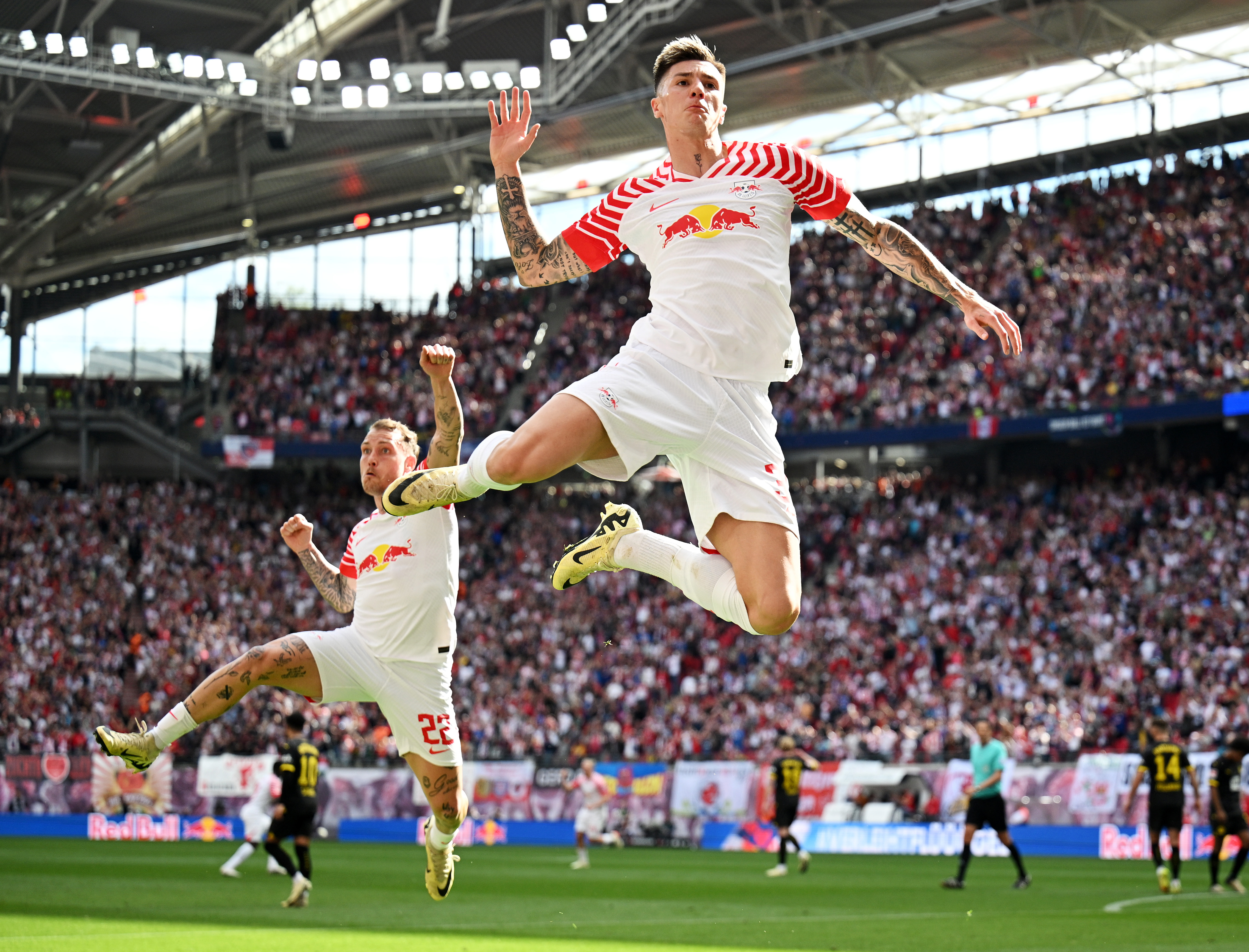 Benjamin Sesko celebrates a goal for RB Leipzig against Borussia Dortmund in April 2024.