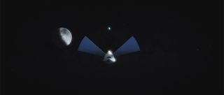 An artist's illustration of SpaceX's Interplanetary Transport leaving Earth to ferry colonists to Mars. SpaceX CEO Elon Musk says he'd like to name the first ship "Heart of Gold" in honor of the fictional ship in Douglas Adams' "Hitchhiker's Guide to the 