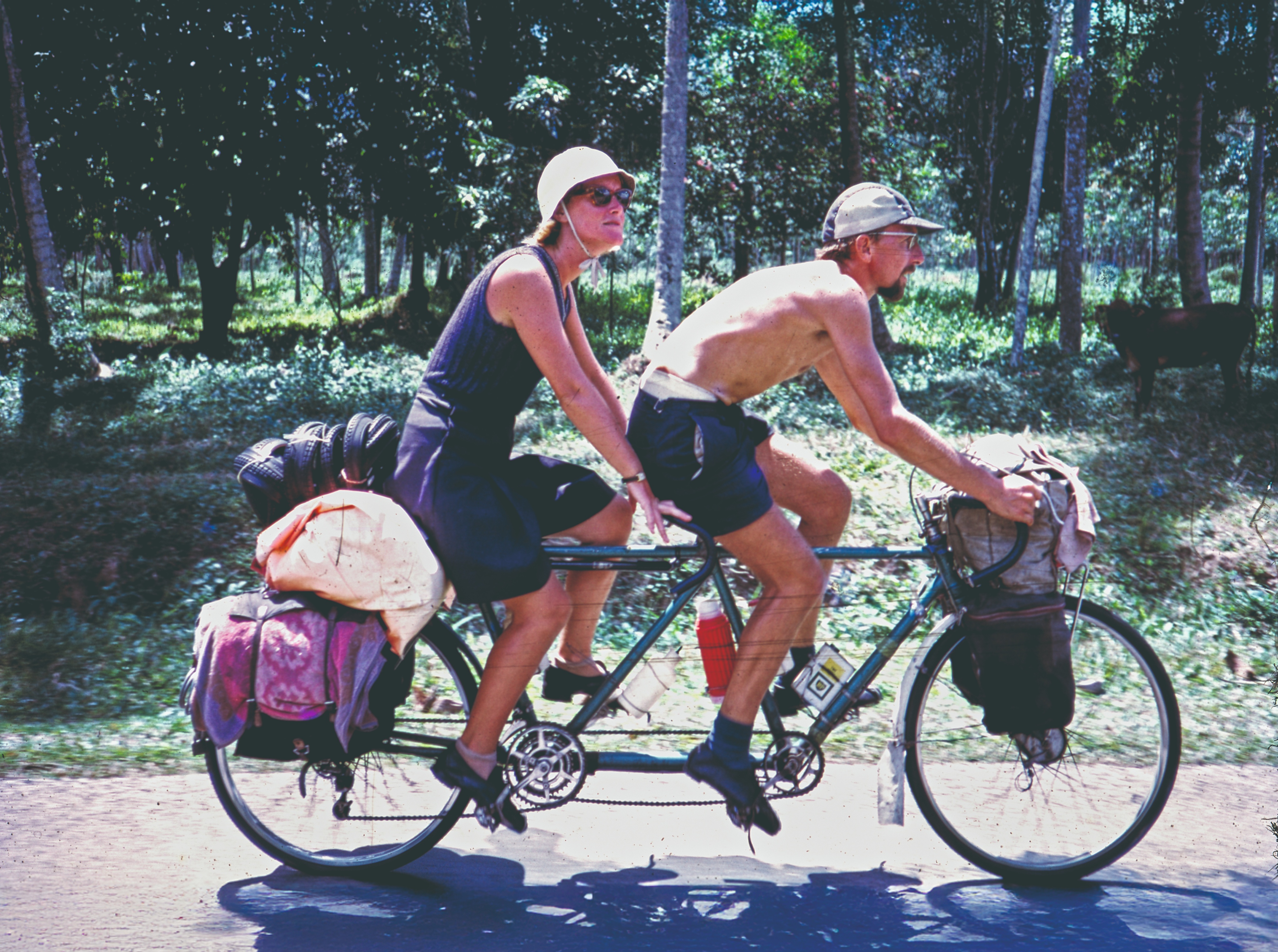 Two people on a tandem bike