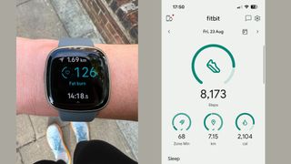 Grace Walsh testing Fitbit Versa 4 on wrist during running workout, displaying Fat Burn heart rate zone notification, next to screenshot from Fitbit app